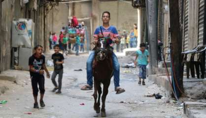 A Alep, les enfants retrouvent le sourire mais ont le ventre vide 