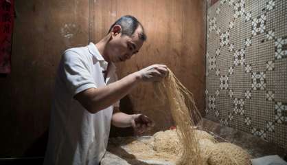 A Hong Kong, l'appétit pour les nouilles ne mollit pas 