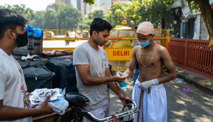 Coronavirus : plus de 100.000 morts en Inde, Madrid bouclée