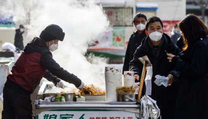 La Chine assouplit ses restrictions sanitaires dans la foulée des manifestations