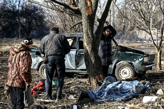 Corps calciné et immeuble éventré: dans l'est de l'Ukraine, la guerre a commencé